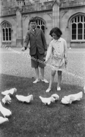 ANTHONY AND MYRA BUTLER FEEDING PIDGEONS  VISCOUNT THURLES